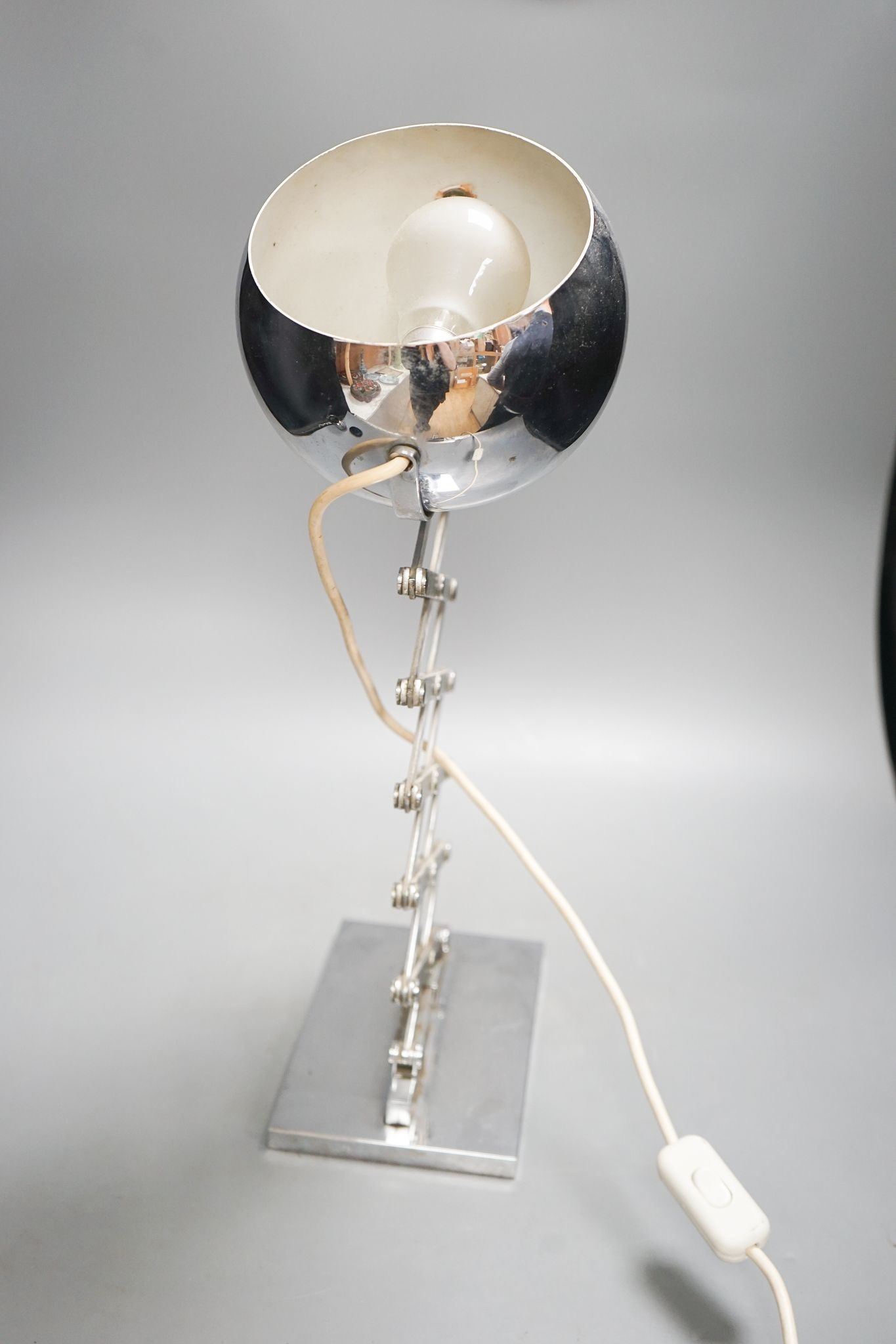 An Ingo Mauser chromed concertina desk lamp